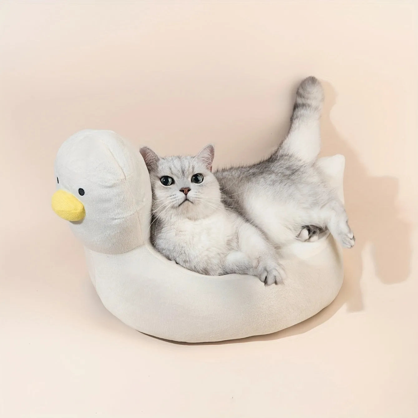 Blue duck-shaped pet bed sofa for small dogs and cats with fluffy polyester cushion