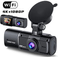 Black dashboard camera mounted on car windscreen showing dual recording capability