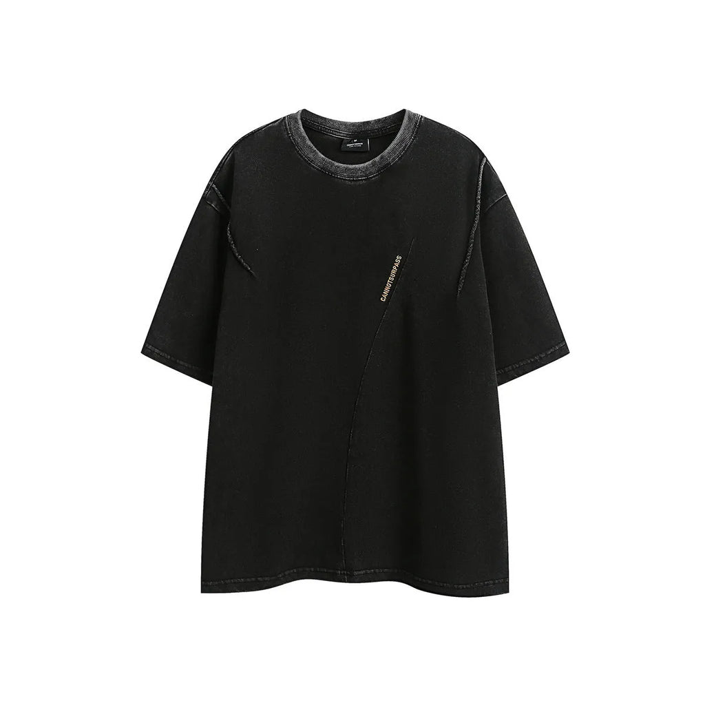 A loose-fit washed cotton short-sleeve retro T-shirt shown in purple and black colour options.