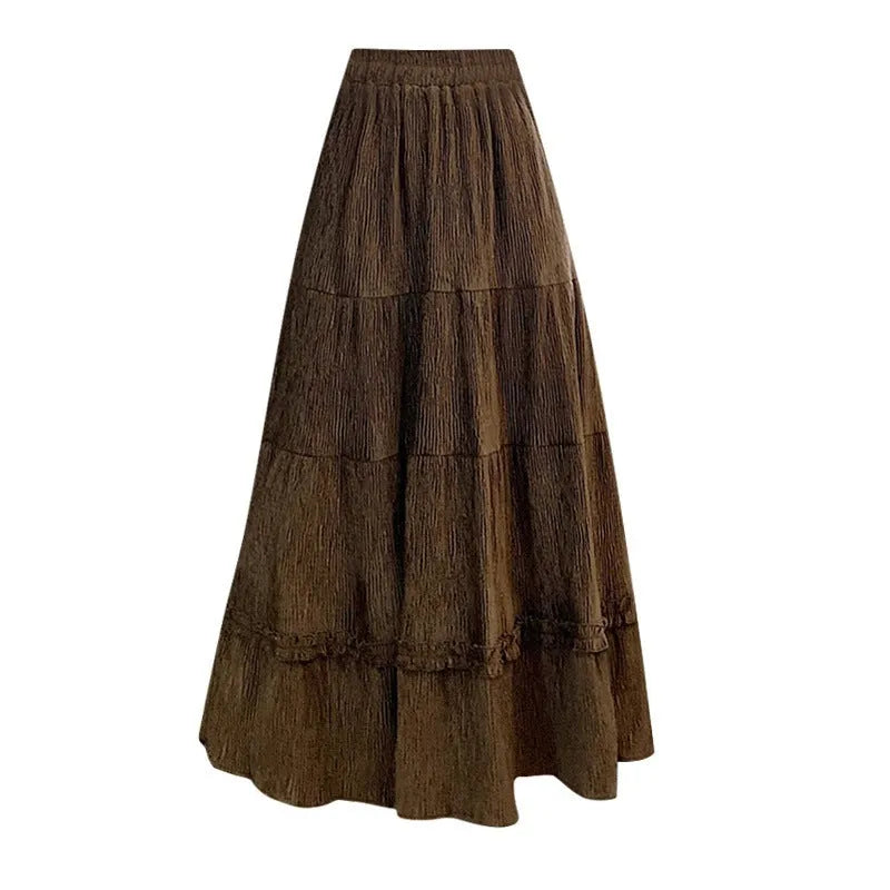 Korean style corduroy A-line midi skirt with elastic waistband in milky white, shown on a model.