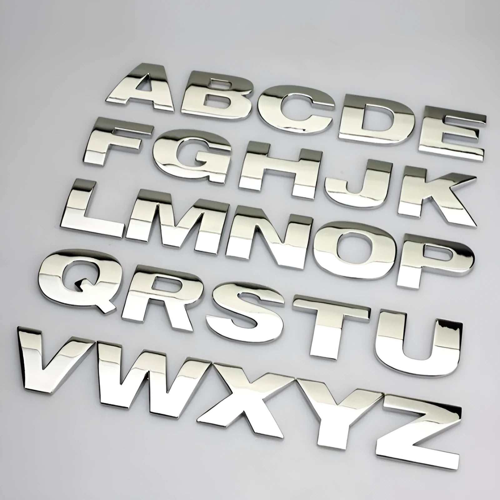 3D metal car bumper sticker showing raised zinc alloy English letter on adhesive backing