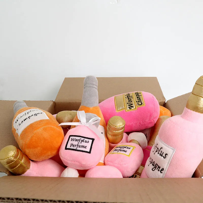 Soft plush wine bottle pet toy for cats and dogs in multiple colours.