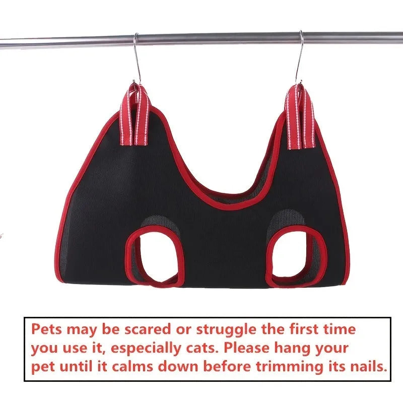 Pet grooming hammock restraint bag hanging for cat or dog nail clipping and bath time.