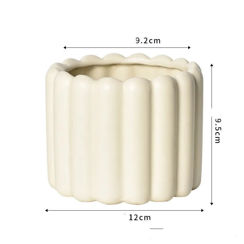 Roman column matte yellow ceramic flowerpot for home plant decoration.
