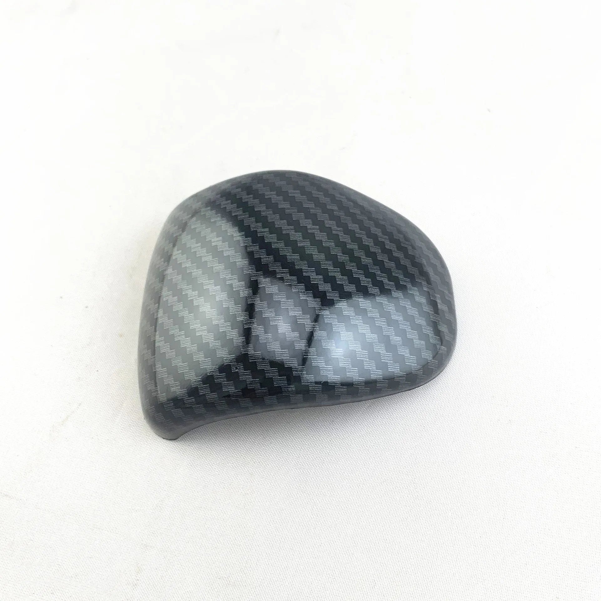 Car gear shift cover with carbon fibre pattern finish