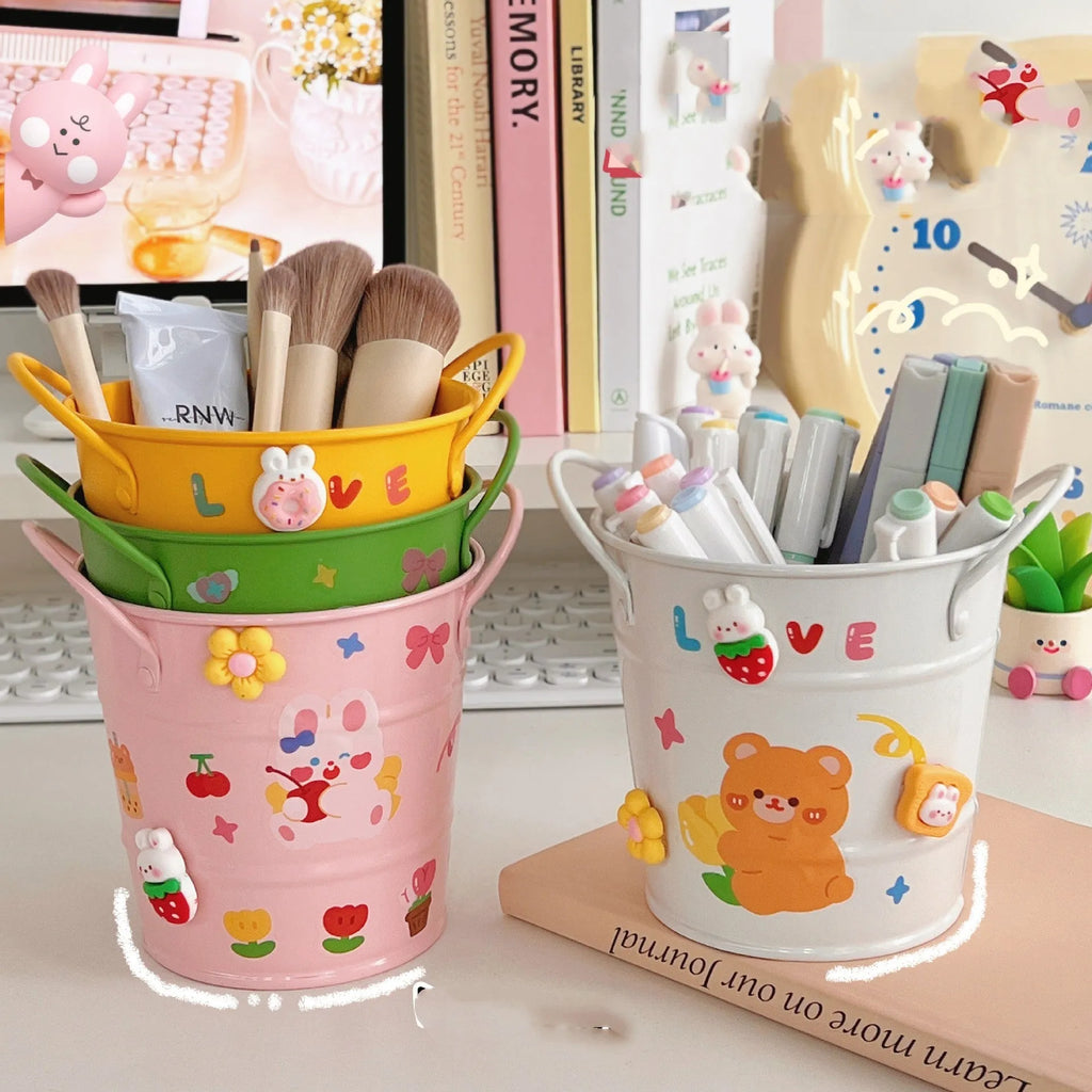 Round metal pen holder in various colours showing solid and sticker patch design options