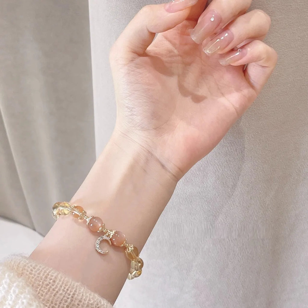 Citrine moonstone crystal bracelet with gold electroplated finish and diamond-shaped design