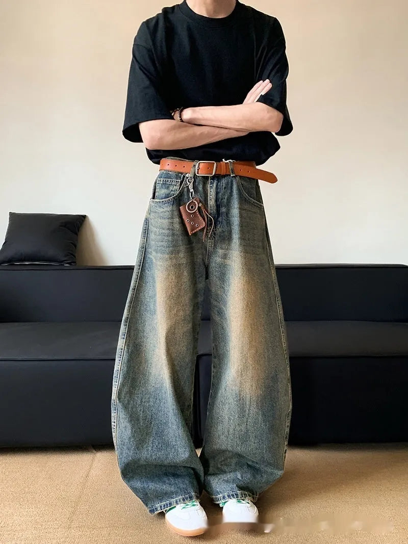 Men's retro blue distressed wide-leg denim trousers with machete styling detail