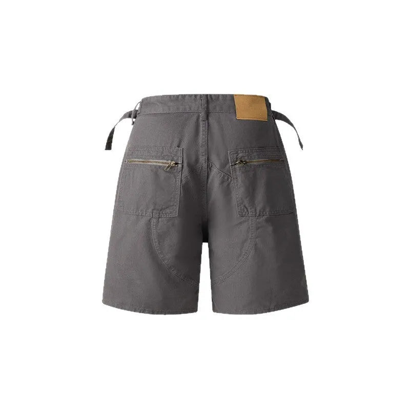 Loose fit retro shorts in washed cotton cloth, shown in grey, green, camouflage, and blue colour options.