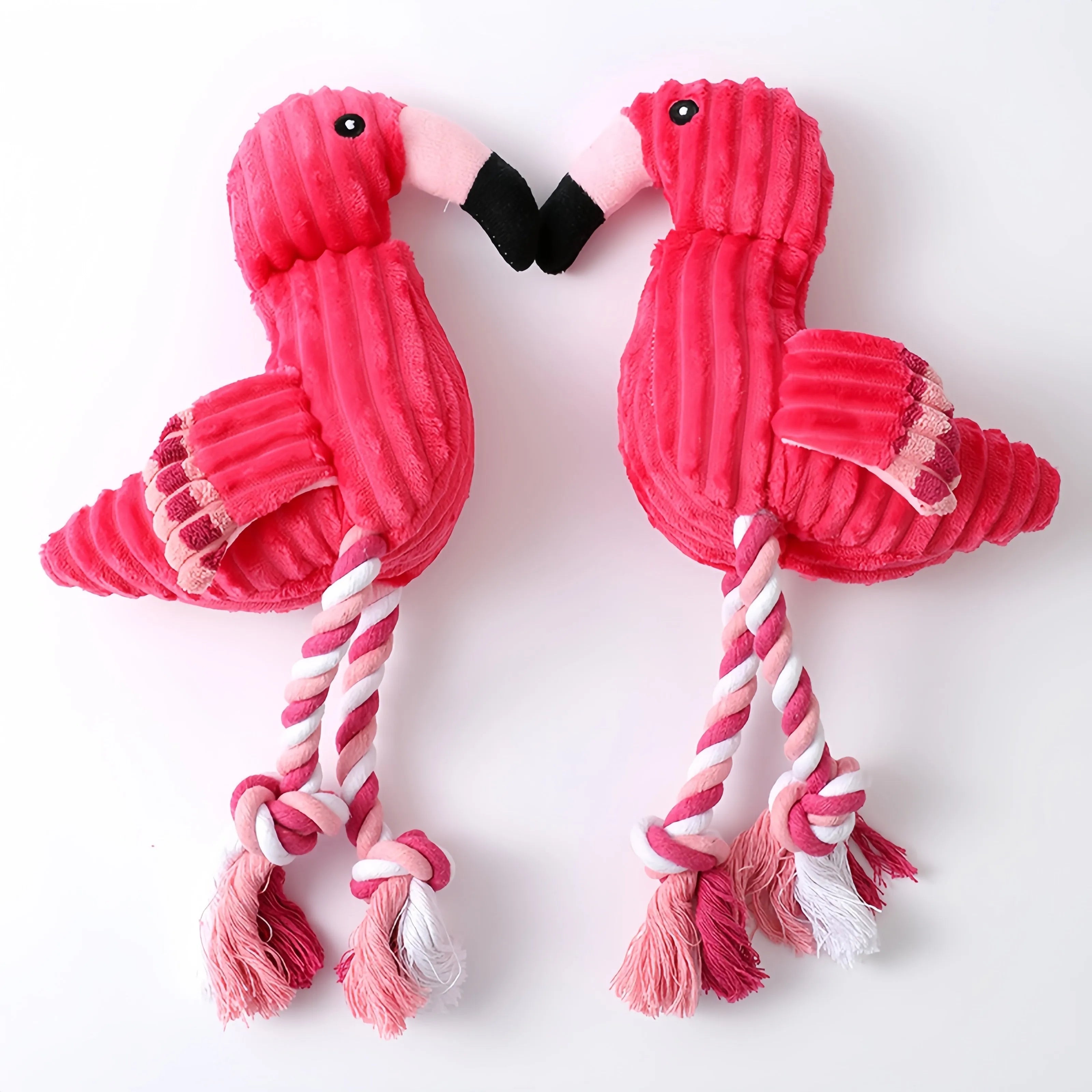 Pink corduroy animal-shaped squeaky dog toy with bite-resistant construction for small and large breeds