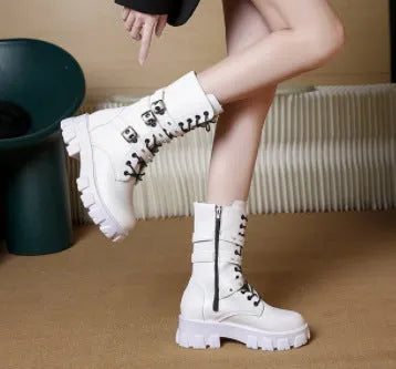 Women's black mid-calf buckle boots with side zipper and round toe