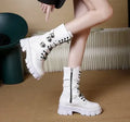 Women's black mid-calf buckle boots with side zipper and round toe