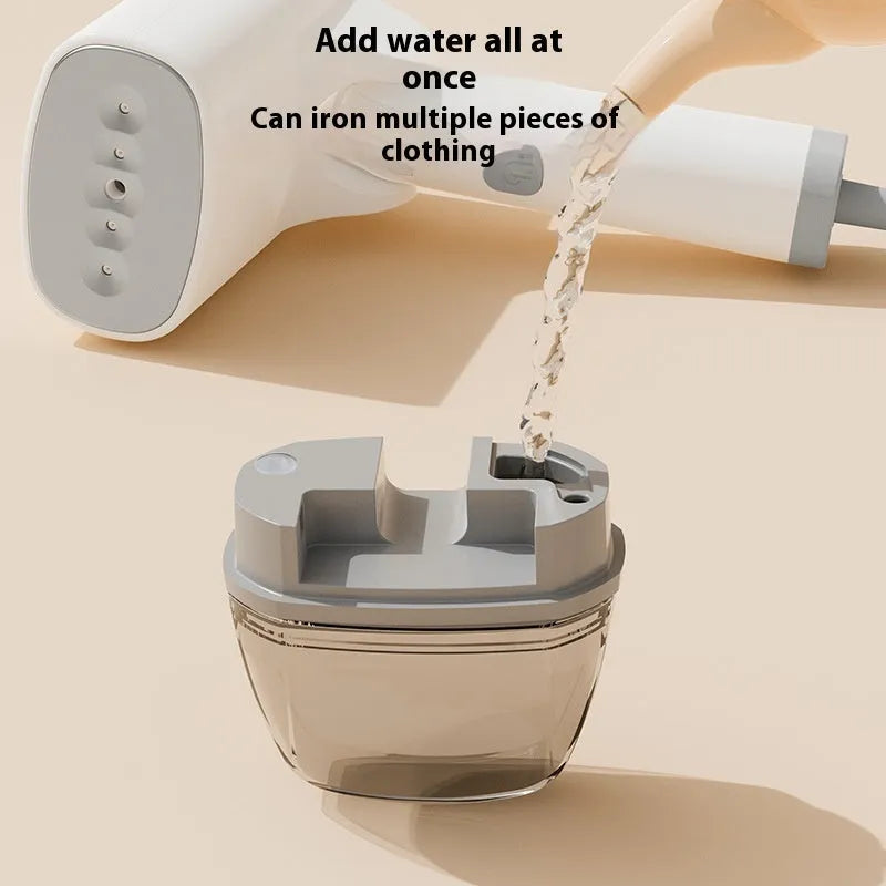 Blue handheld garment steamer with mechanical controls and water tank