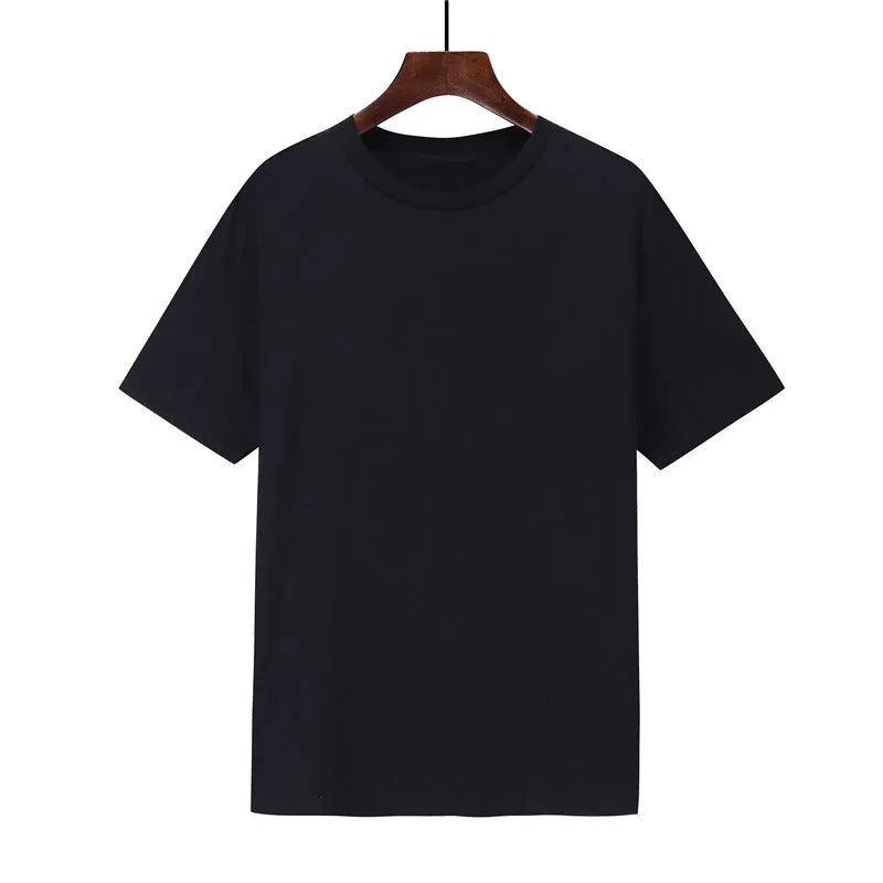 Men's loose black cotton short sleeve t-shirt on a hanger, showcasing the loose fit design.