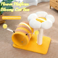 Yellow cat tree with sisal scratching posts and a fabric tunnel.