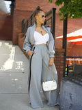 Striped zip-up sweater and solid trousers two-piece tracksuit set in street hipster style