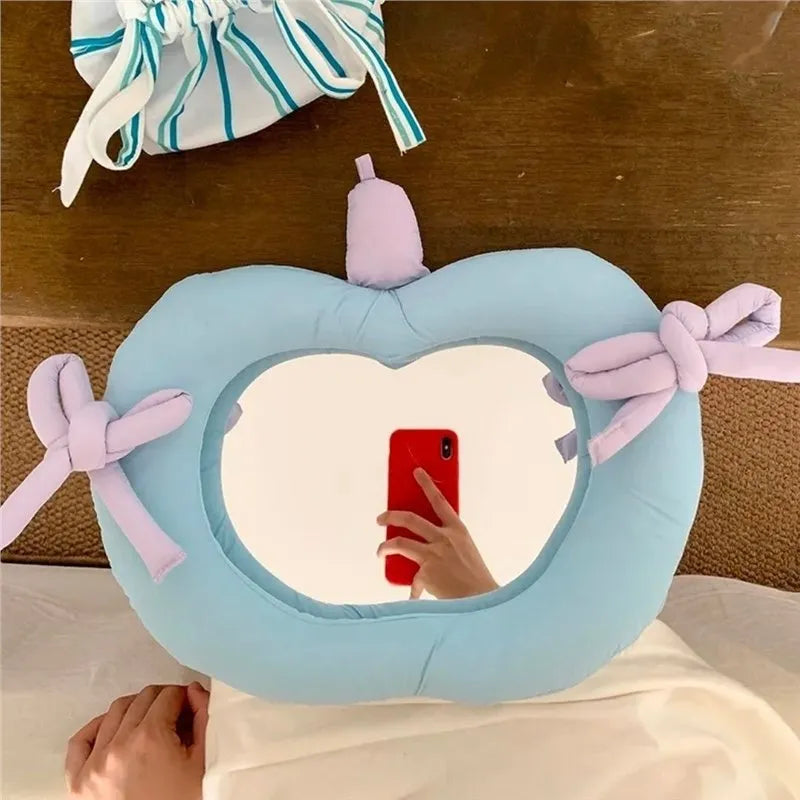 Korean-style wall mirror with aluminium lens and fabric cushion backing in apple green colour