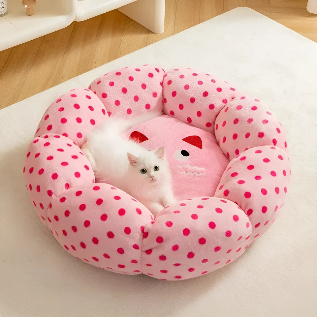 Pink cat bed cushion with dot pattern showing two size options for cats up to 20 pounds