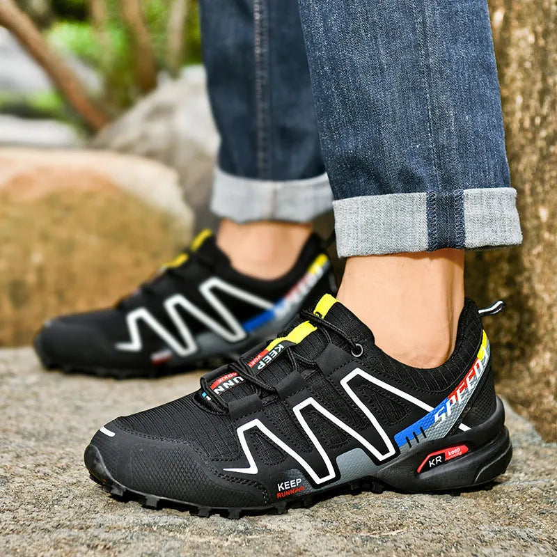 Men's gray orange plus size casual shoes with low-top design and rubber sole.