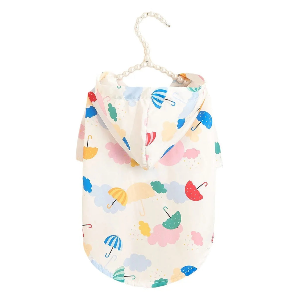 Colourful cartoon umbrella pattern dog raincoat in polyester fabric shown in multiple pet sizes