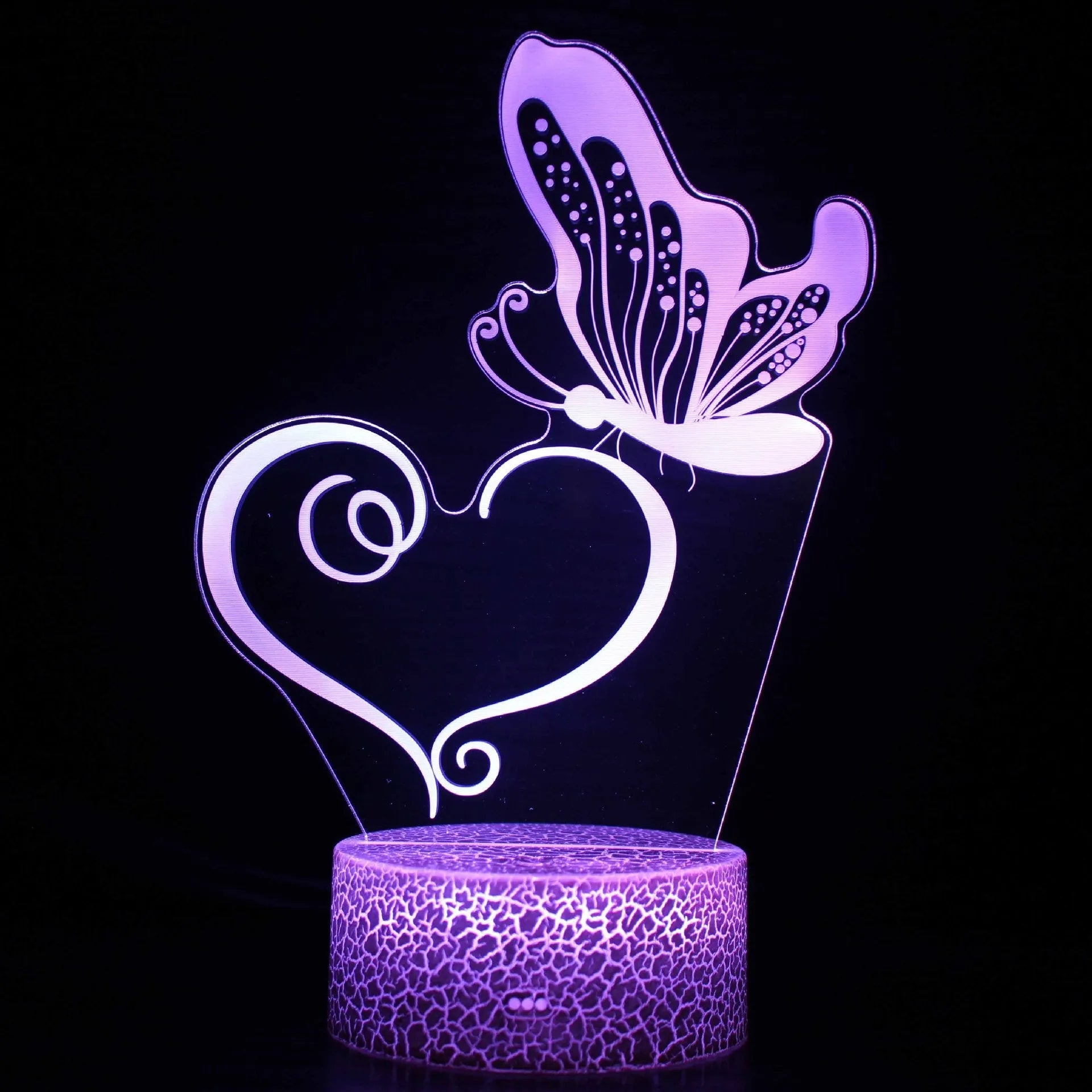 Acrylic 3D colourful crack base USB table lamp with touch control on a desk.