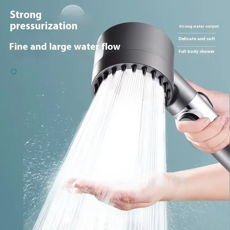 Portable white ABS plastic shower head with modern design and adjustment dial.