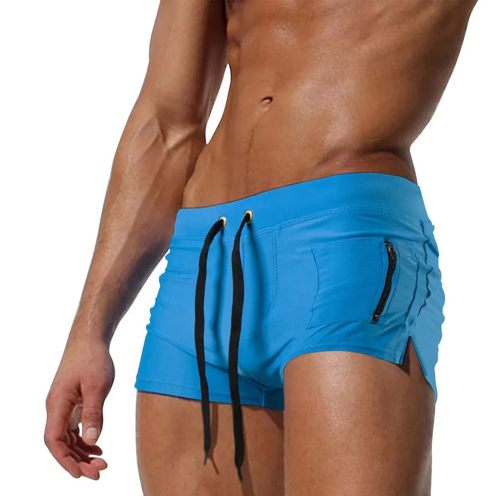 Men's black high waist swimming trunks with a lace-up front, briefs style.