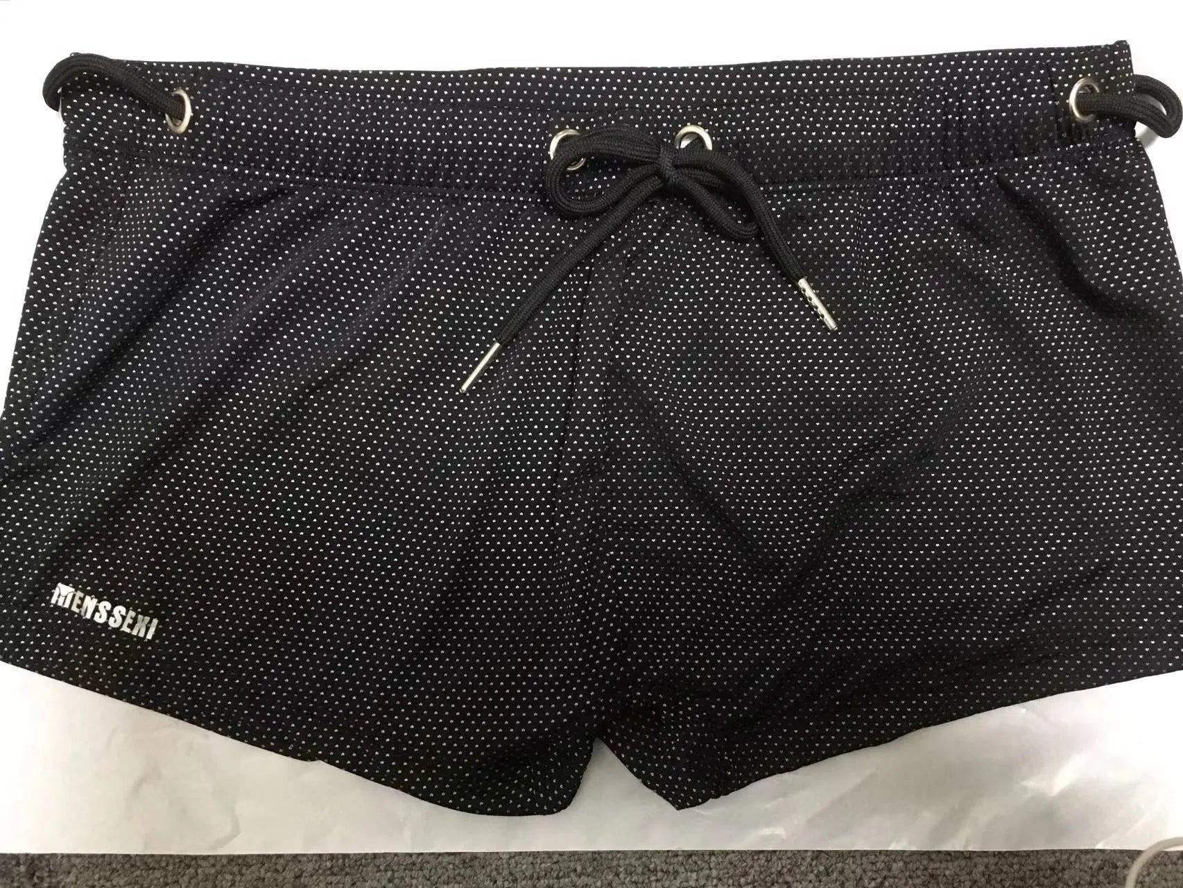 Men's low waist boxer swimming trunks in nylon lace fabric available in multiple solid colours