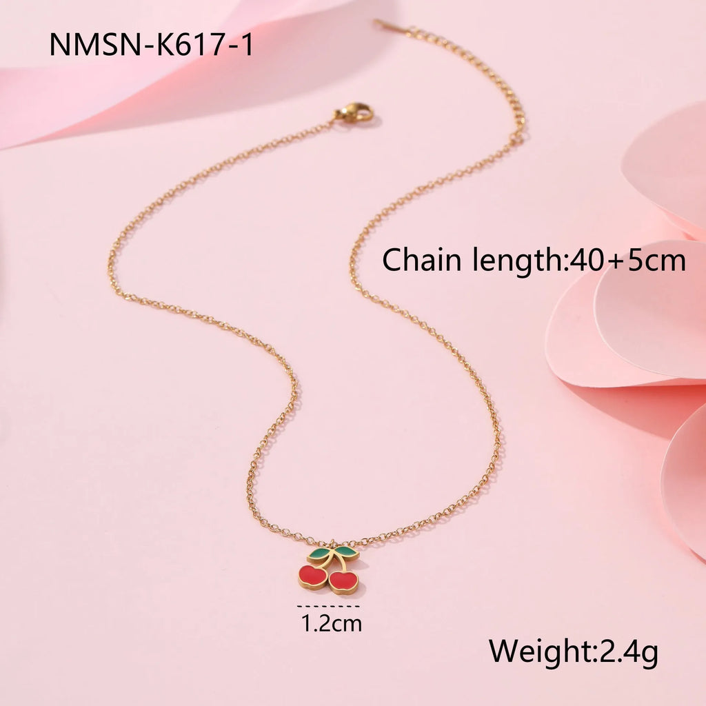 Cherry jewellery set showing necklace, bracelet, earrings, and ring in stainless steel with cherry design