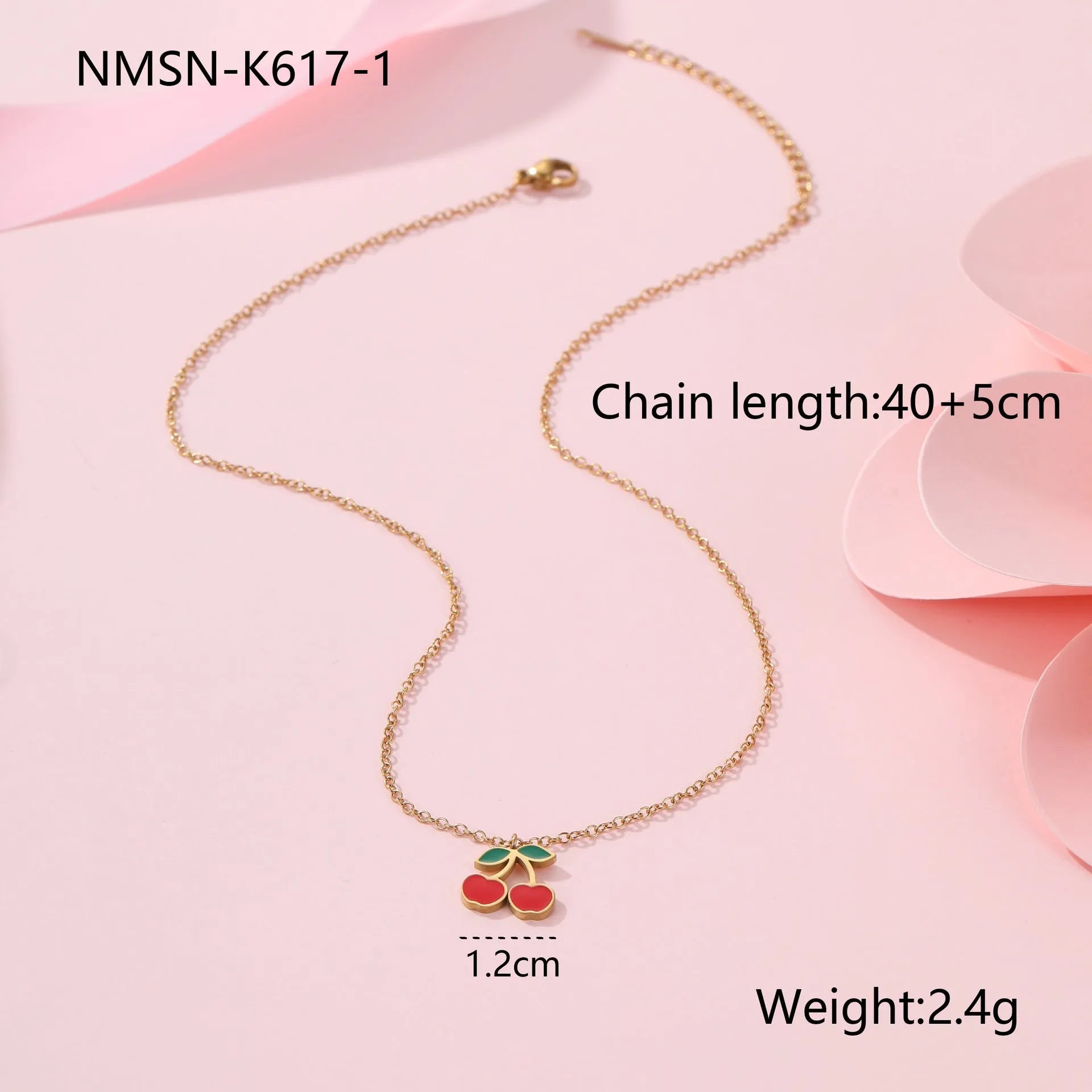 Cherry jewellery set showing necklace, bracelet, earrings, and ring in stainless steel with cherry design