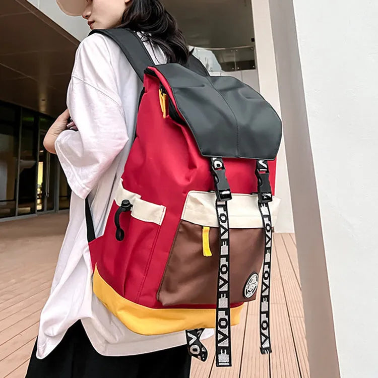 Oxford cloth backpack shown in black, green or red with handheld and shoulder straps.
