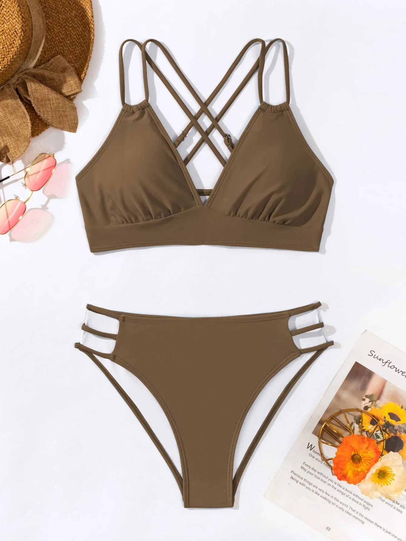 Adult women's black V-neck halter bikini with split-leg high-cut shorts.