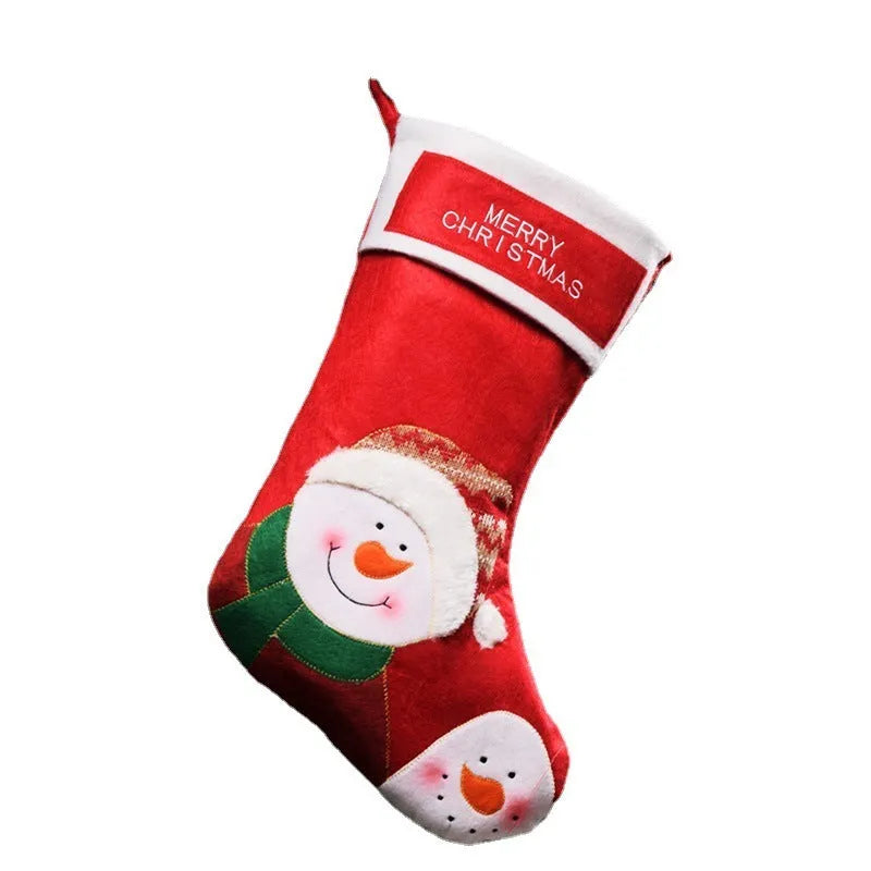 Set of three Christmas stocking ornaments with snowman, elk, and elderly figure designs