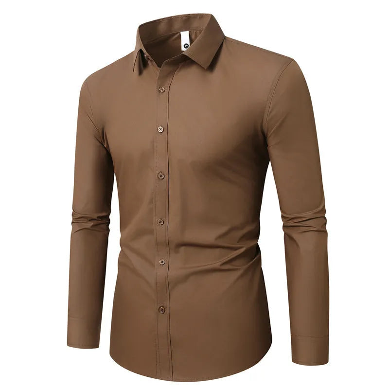 Long sleeve linen shirt in a loose fit, shown in a solid colour, with a button front and standard collar.