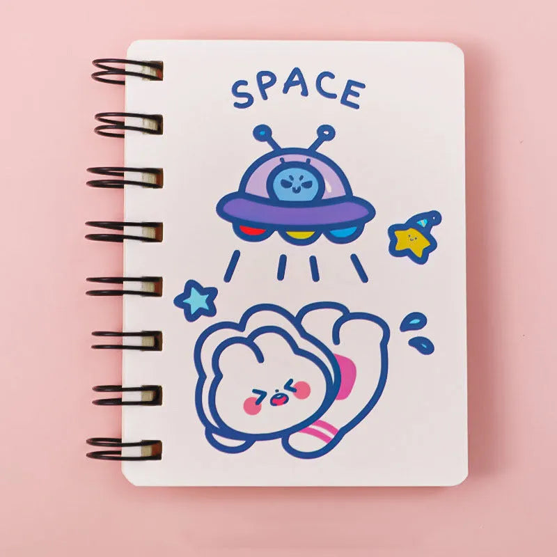 Astronaut-themed pocket flipper notebook showing compact 10.5 by 8 cm dimensions with space character cover options