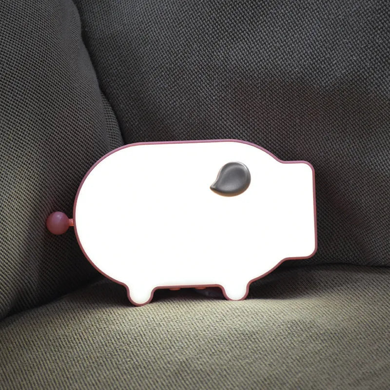 Blue multifunctional LED alarm clock showing time and temperature display with USB charging port