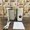 Grey and white car charger electric milk warmer for infant bottles