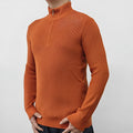 Men's black half-turtleneck zipper sweater with long sleeves on a grey background
