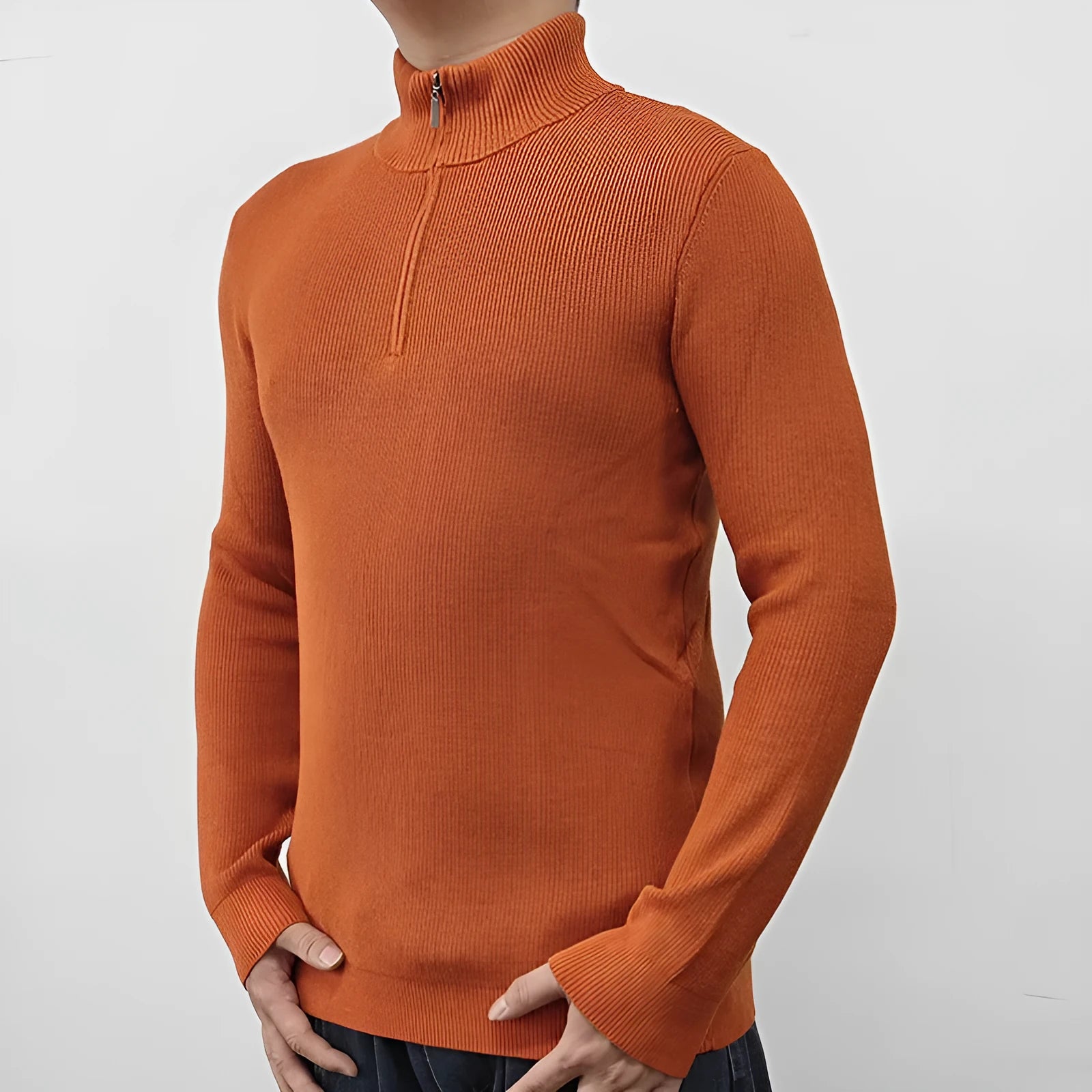 Men's black half-turtleneck zipper sweater with long sleeves on a grey background