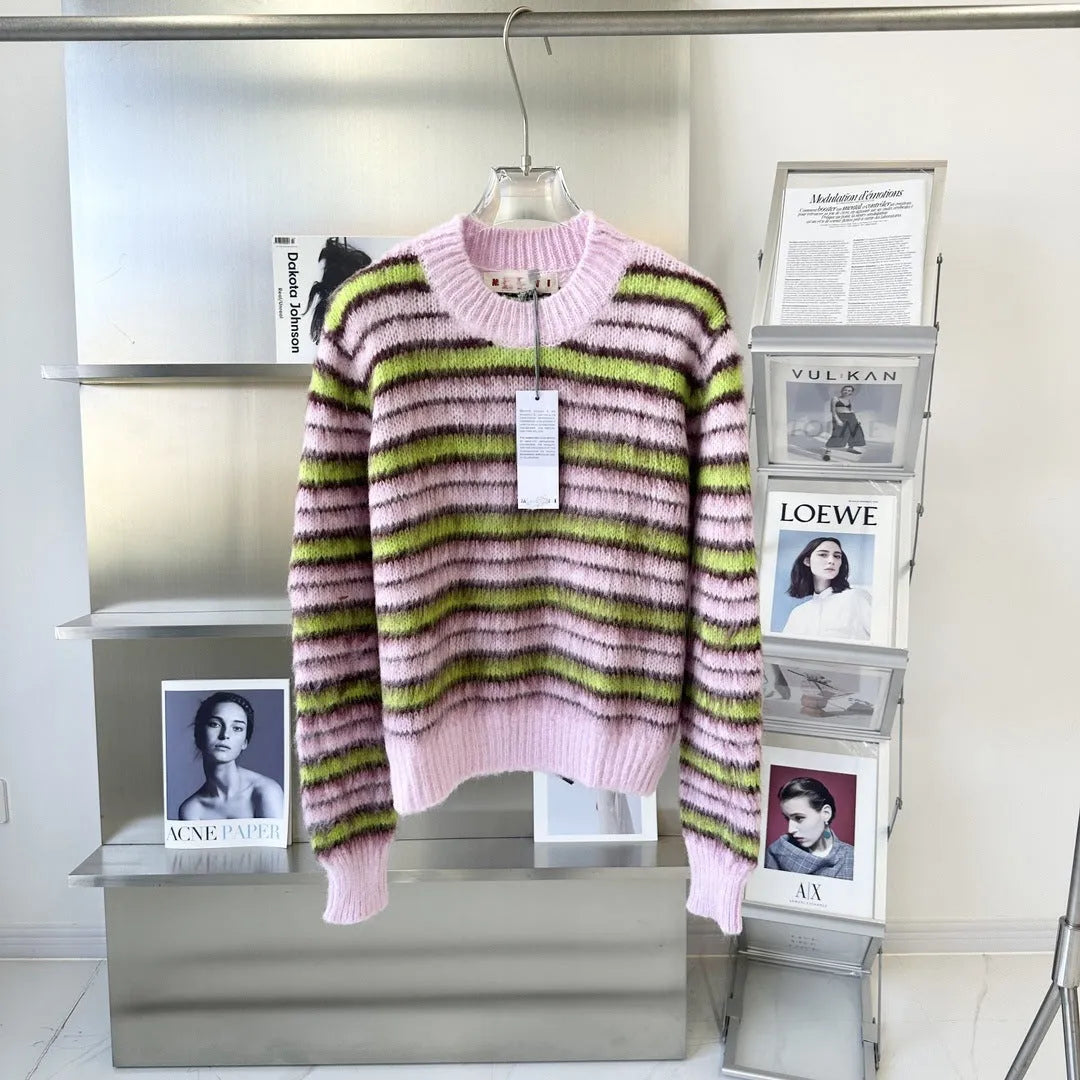Pink women's wool knitted cardigan and pullover sweater with contrast colour detail on hanger