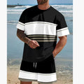 Man wearing a loose-fit, short-sleeved polyester T-shirt and matching shorts in a light colour.