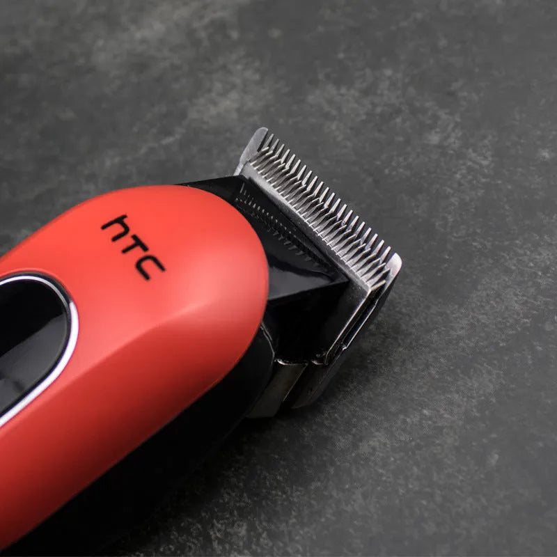 Professional digital electric hair clipper in black, red, or white with brushless motor and waterproof design