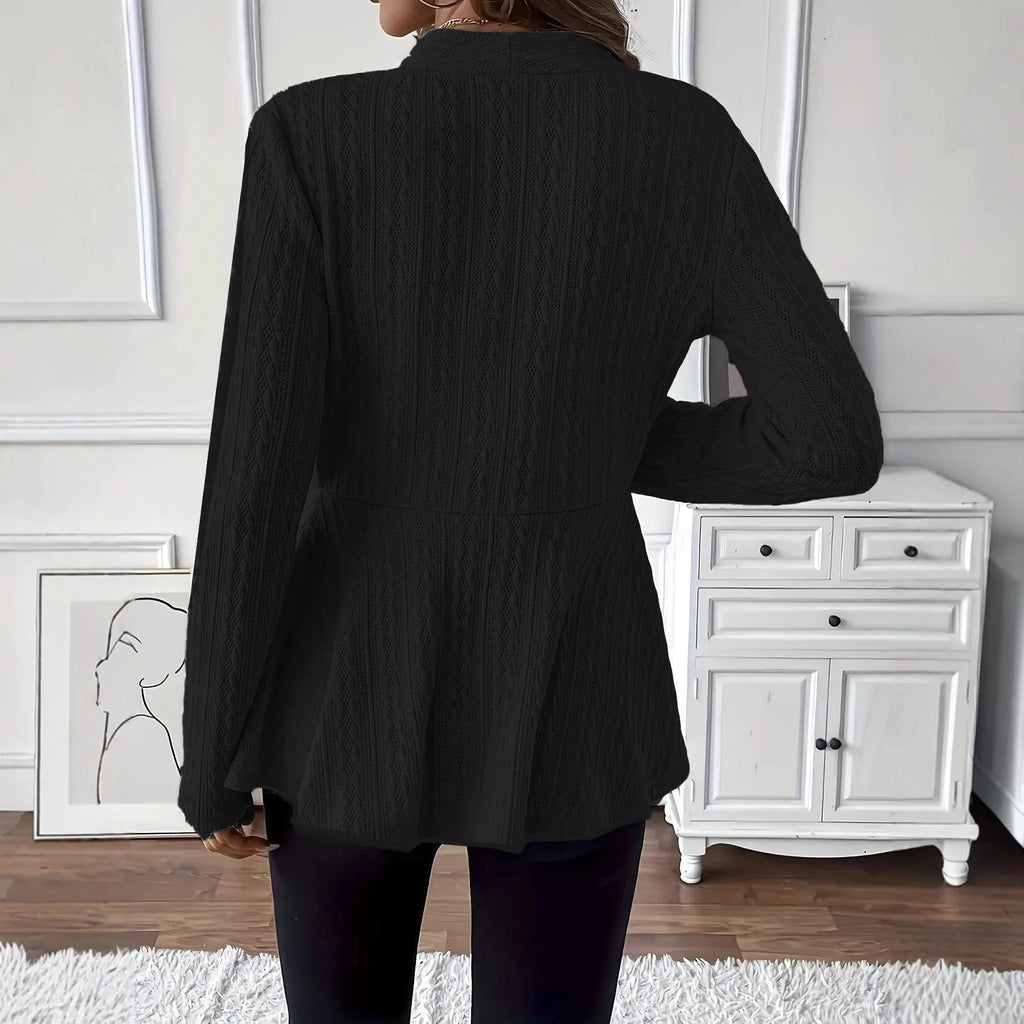 Women's apricot coloured Jacquard patterned knitted cardigan with one button front.