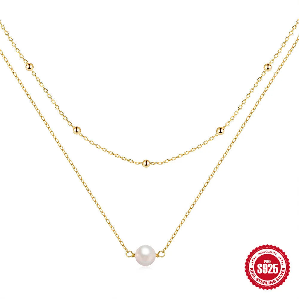 S925 sterling silver double layer necklace with twin pearls on a ball bead chain in gold colour.