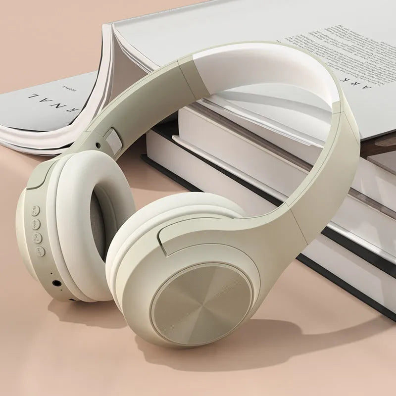 Creative wireless Bluetooth headset in Ivory White colour with head-mounted design and charging case