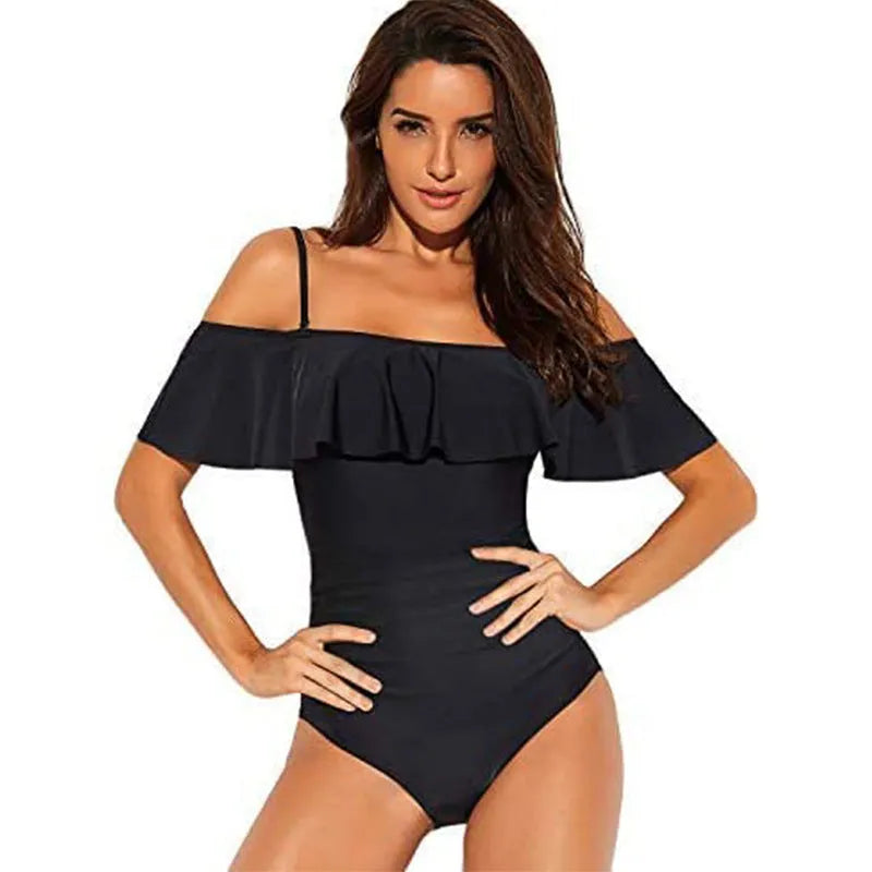 Black one-piece swimsuit with cut-out detailing and ruffled strap tube top design