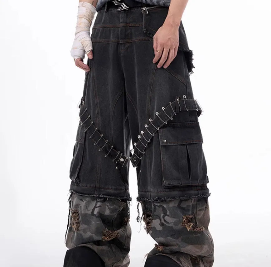 Men's grey camouflage jeans showing pin and ribbon splicing detail on the leg.