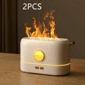 Black USB-powered desktop humidifier with glowing orange flame effect and water vapour mist.