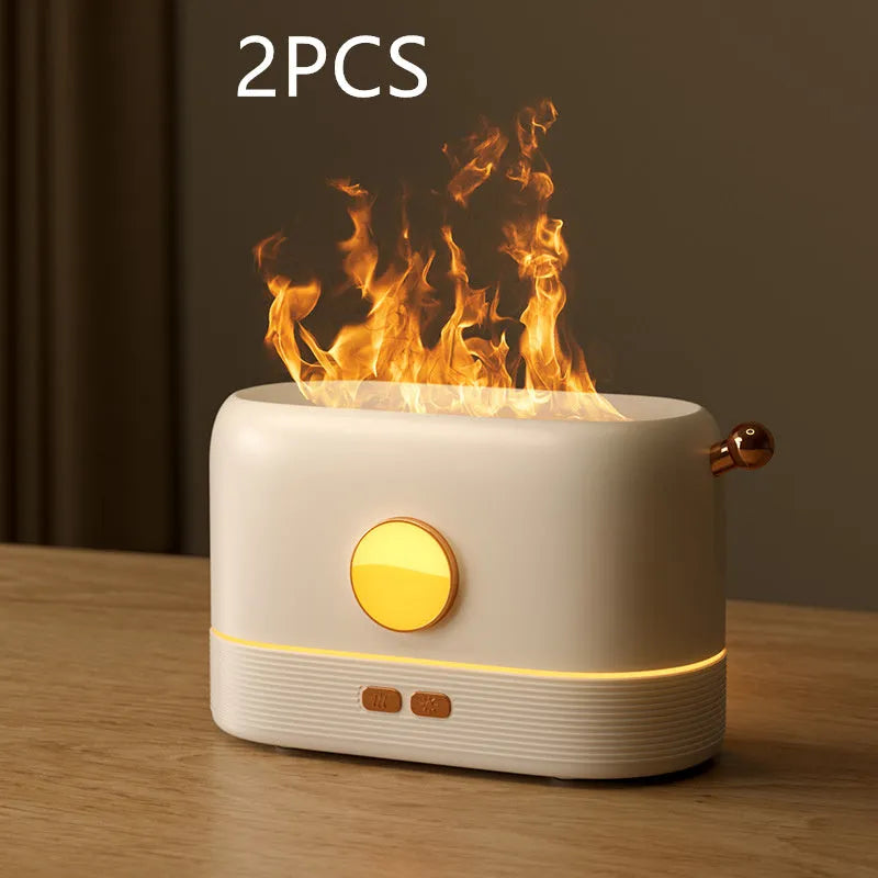 Black USB-powered desktop humidifier with glowing orange flame effect and water vapour mist.