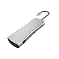 Grey aluminium USB-C docking station with HDMI, VGA, and USB ports on 140mm cable